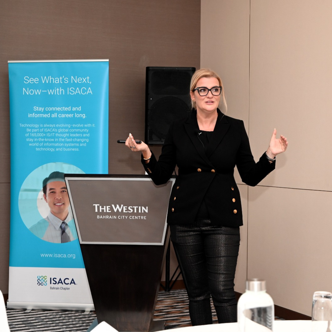 Ramona Ratiu speaking on an ISACA conference panel